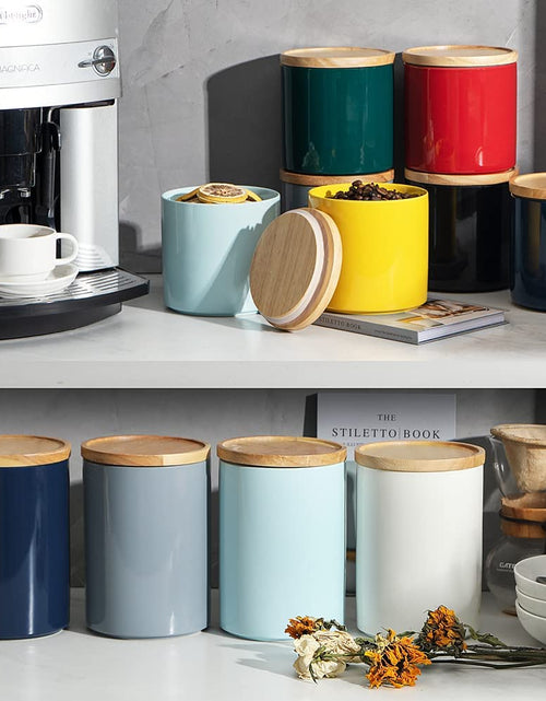 Load image into Gallery viewer, Kitchen Canisters 58 FL OZ Ceramic Food Storage Jar, Stackable Containers with Airtight Seal Wooden Lid for Serving Coffee Bean, Flour, Tea, Cookies and More (Navy)
